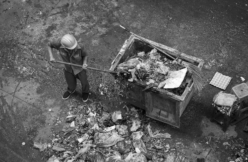 Business waste removal truck operating in Islington