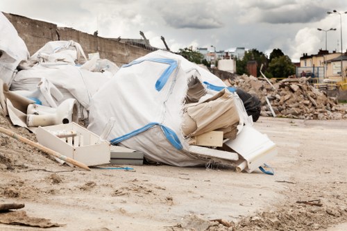 Construction debris being cleared from a building site in Islington