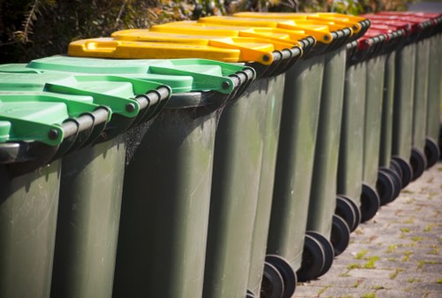 Trucks loading builders waste for disposal