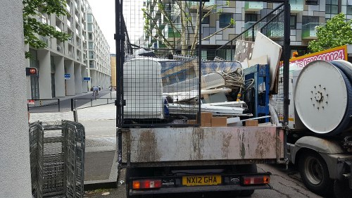 Before and after garden clearance transformation in Islington